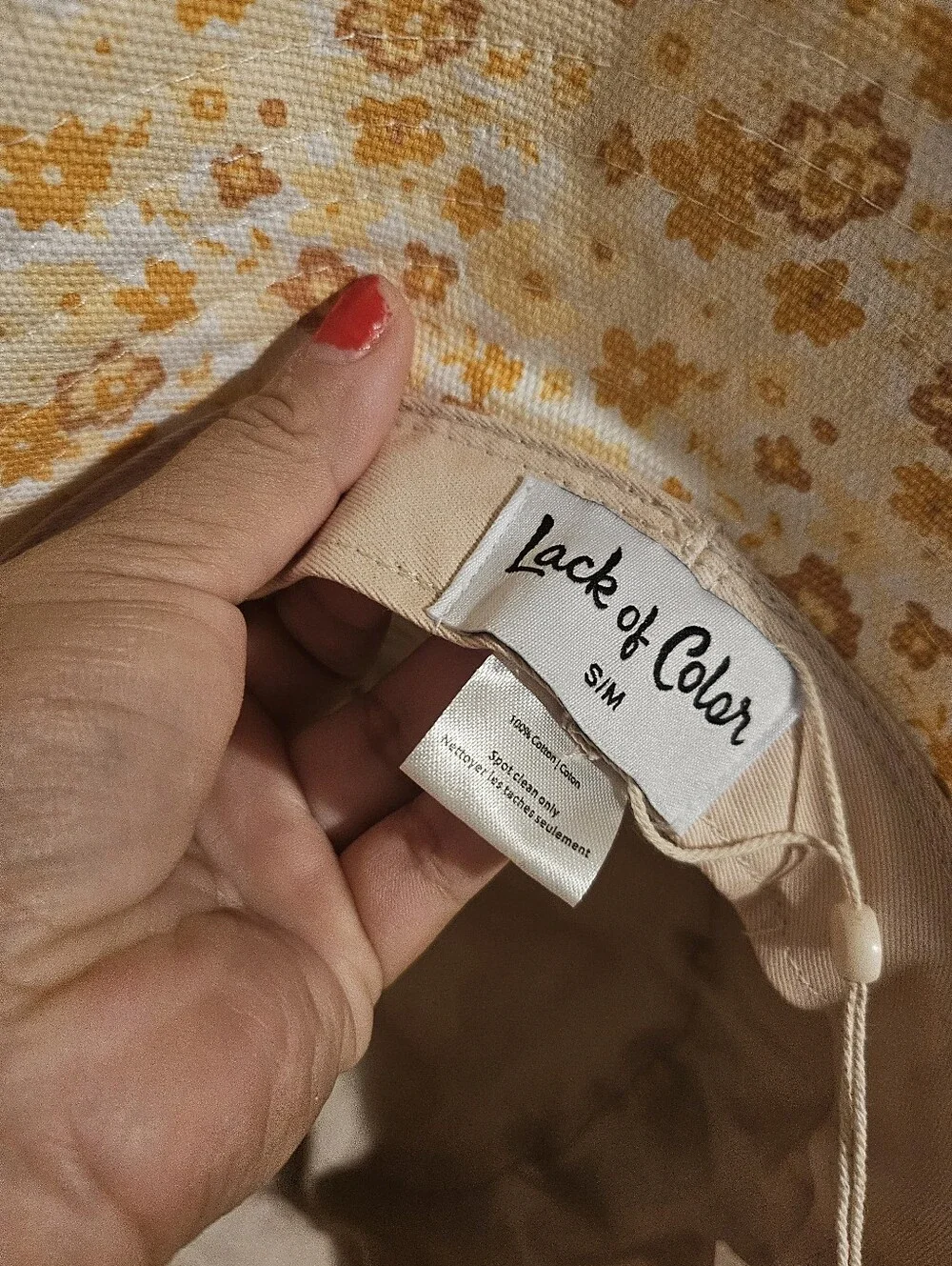 Lack of Color Holiday Bucket Hat in the Peach Bloom pattern